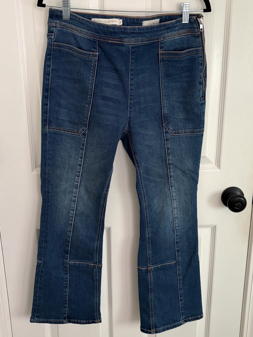 Anthropologie Dark Blue cropped Flare Jeans with Front Patch Pockets